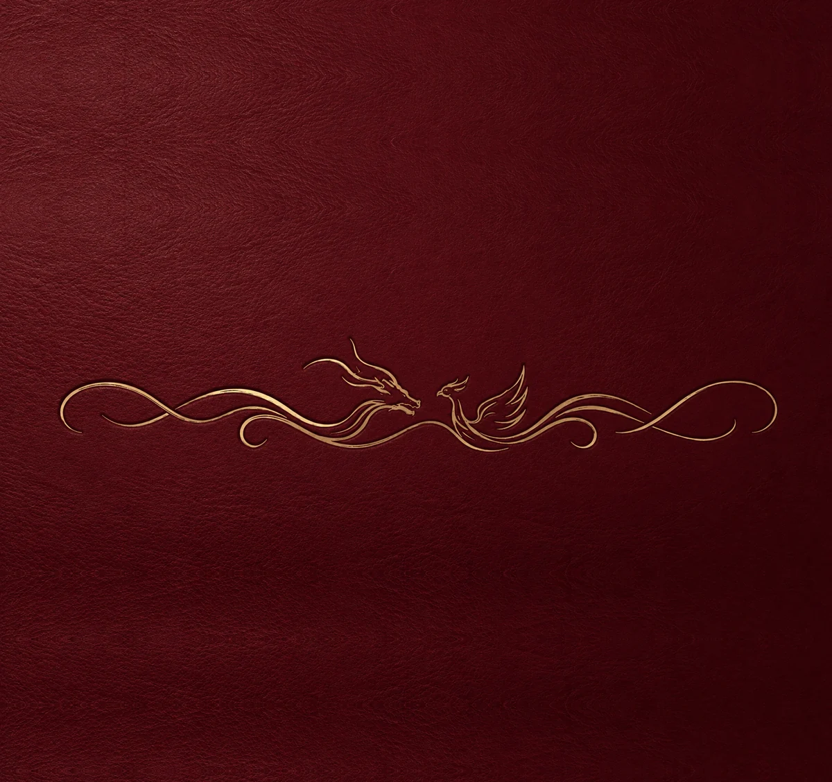 Gold dragon and phoenix embossed on tactile burgundy leather